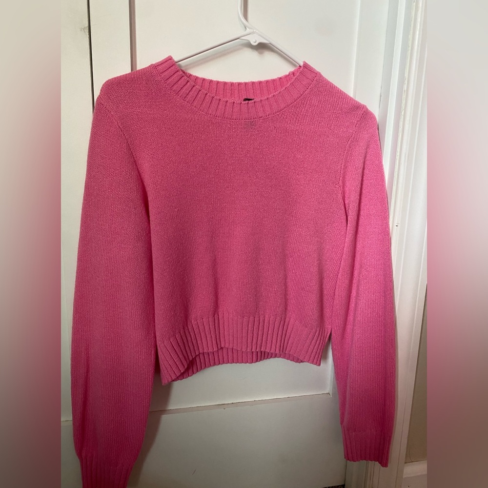 divided pink sweater